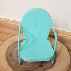 Miniature vintage metal shell chair